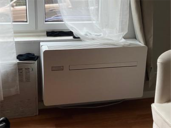 Double-paned Low-E and Ephoca Wall Heat Pump Unit in NY